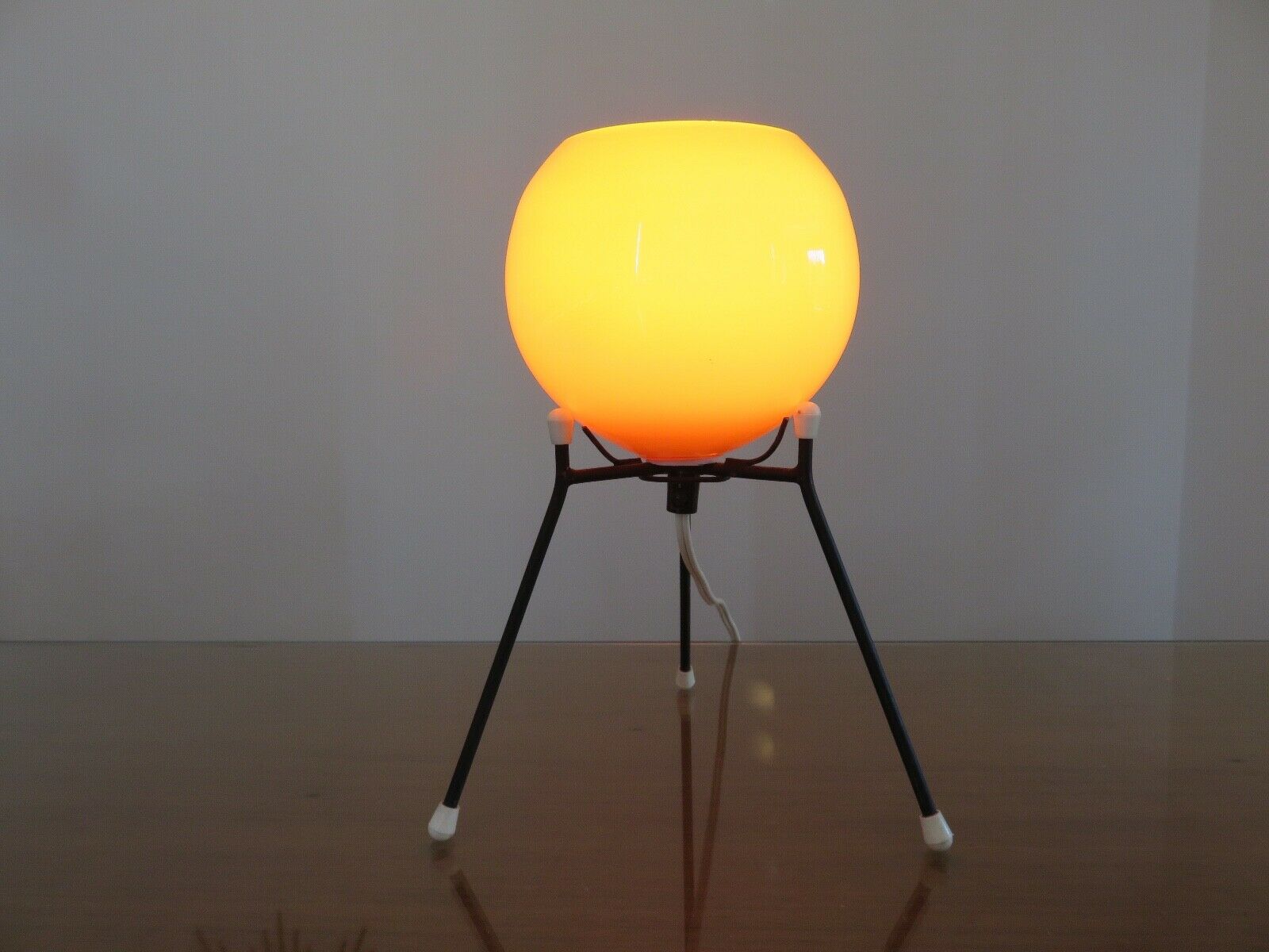 Tripod lamp "Sputnik" in orange opaline and black lacquered metal 60s 70s