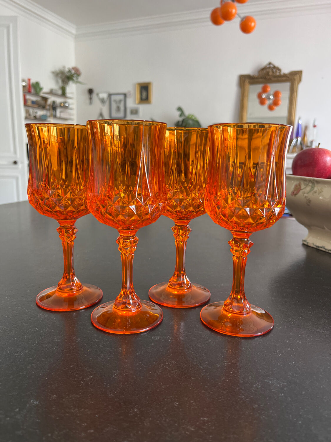 4 orange crystal glasses
