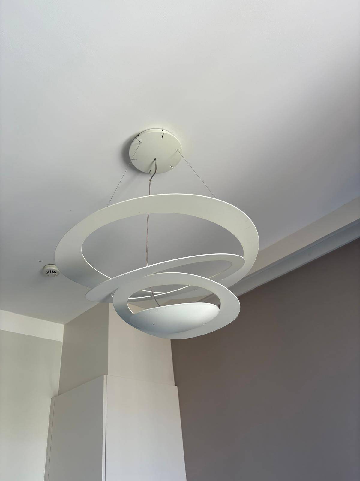 White Artemide suspension