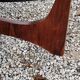 Designer coffee table by Hugues Poignant in rosewood and smoked glass from the 70s
