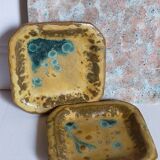 Set of three potter's plates in enamelled earth