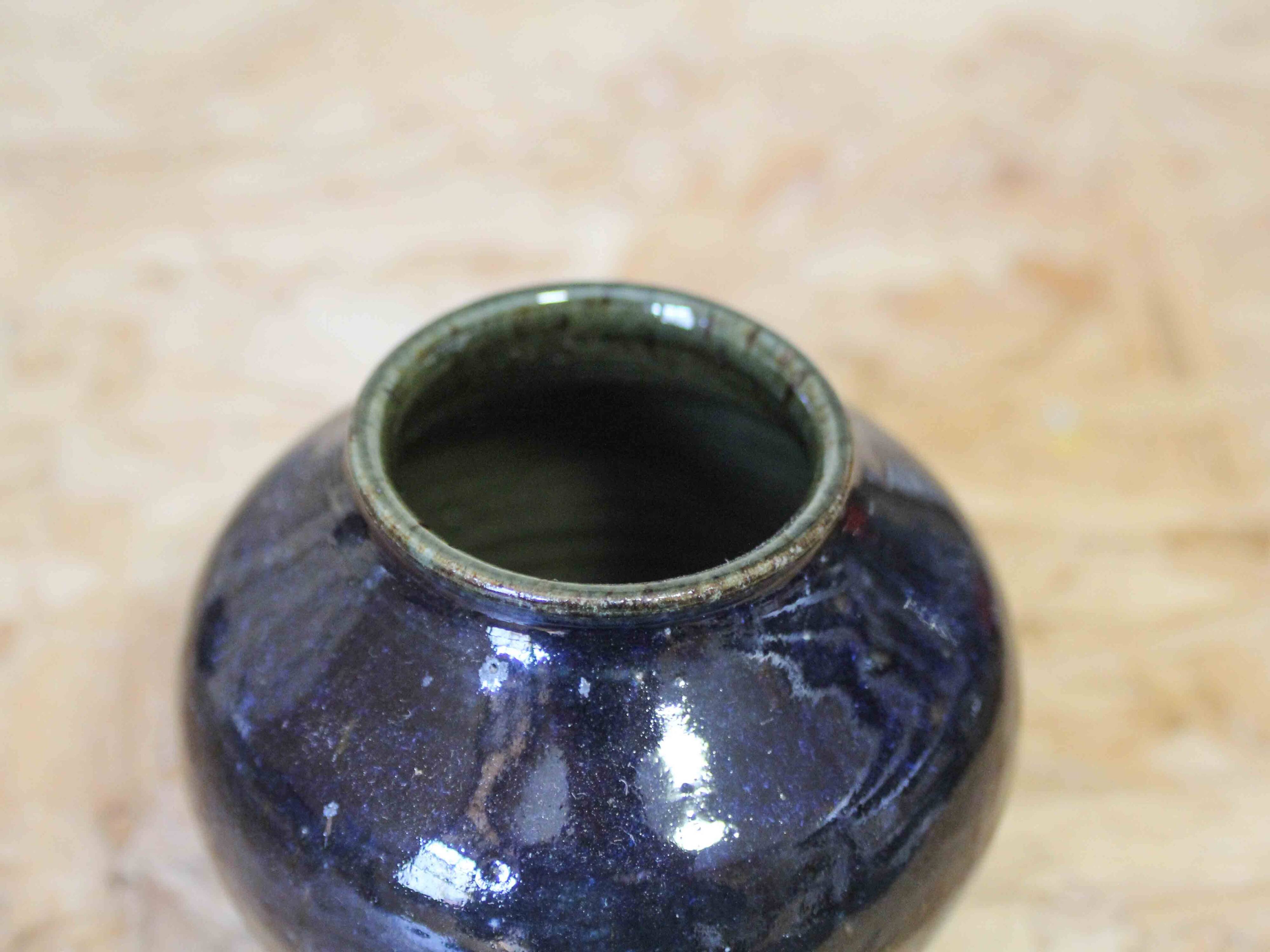Small glazed stoneware vase signed