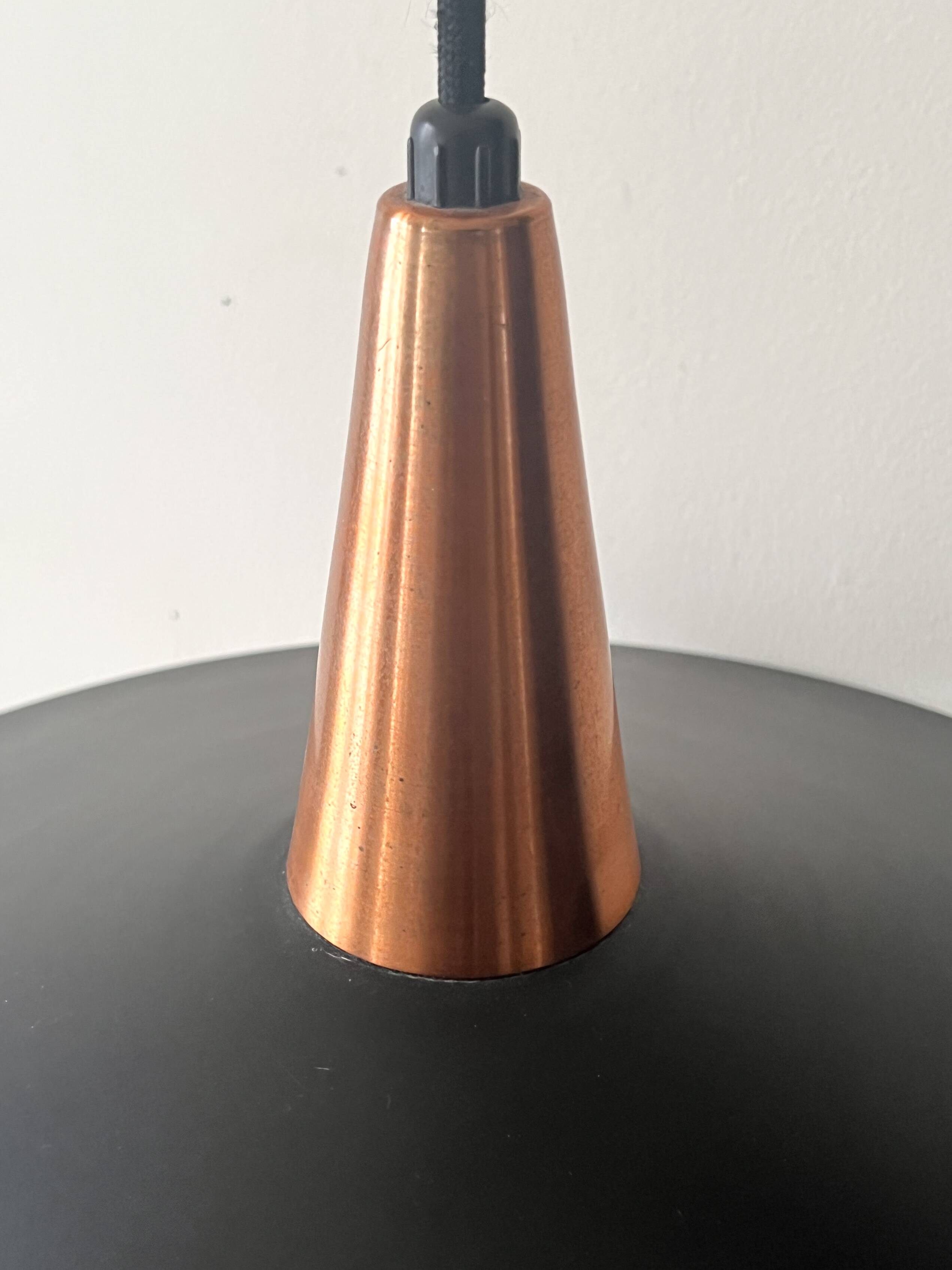 Scandinavian suspension in black metal, copper, and opal glass, 1970s design.