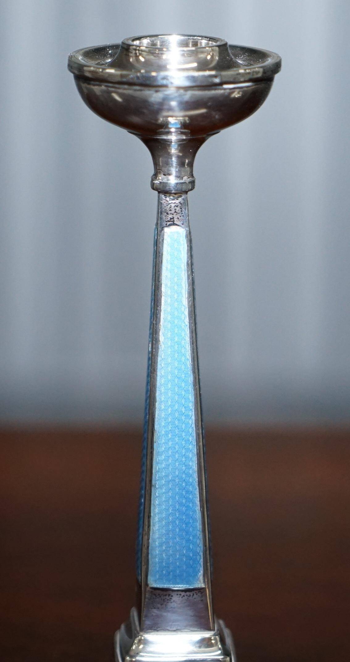 Pair of sterling silver and enamel candlesticks 1927 by Charles Green & Co.