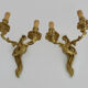 Old pair of wall sconces with double fires in bronze, 50s
