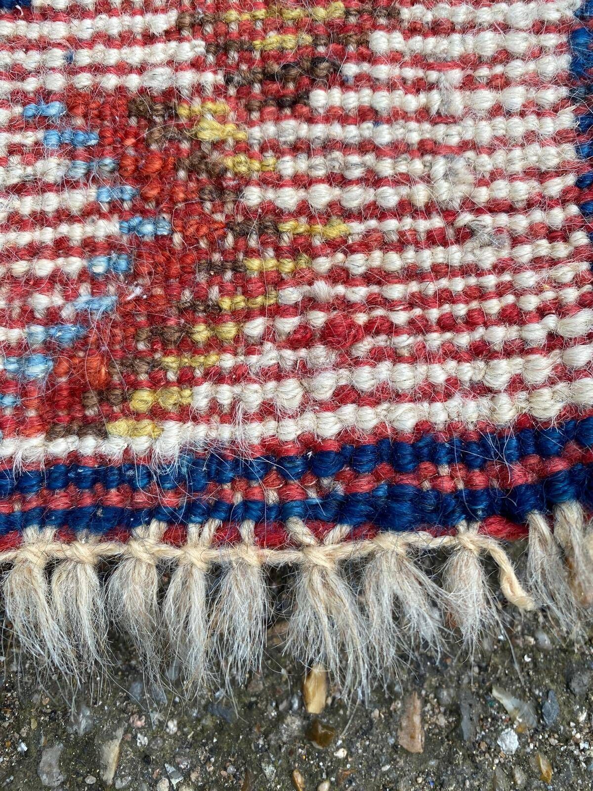 Handmade wool Berber rug with long pile, 110x150cm.
