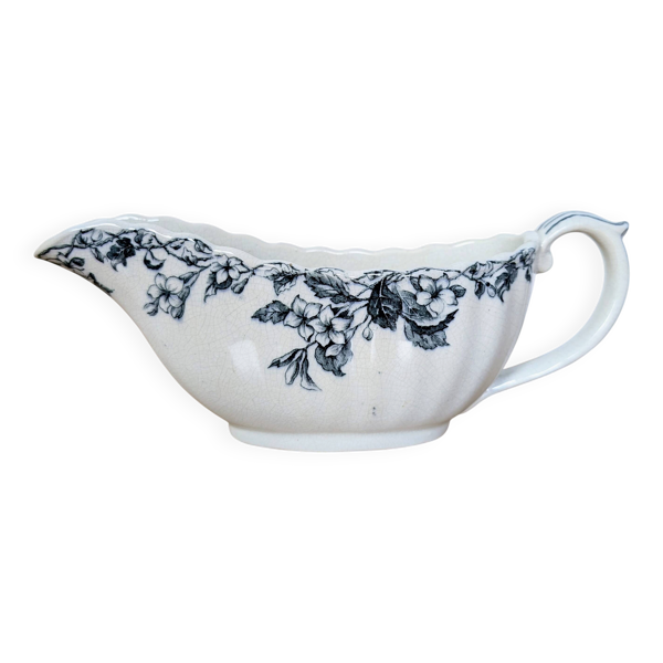 Saucière ancienne en faïence à décor floral