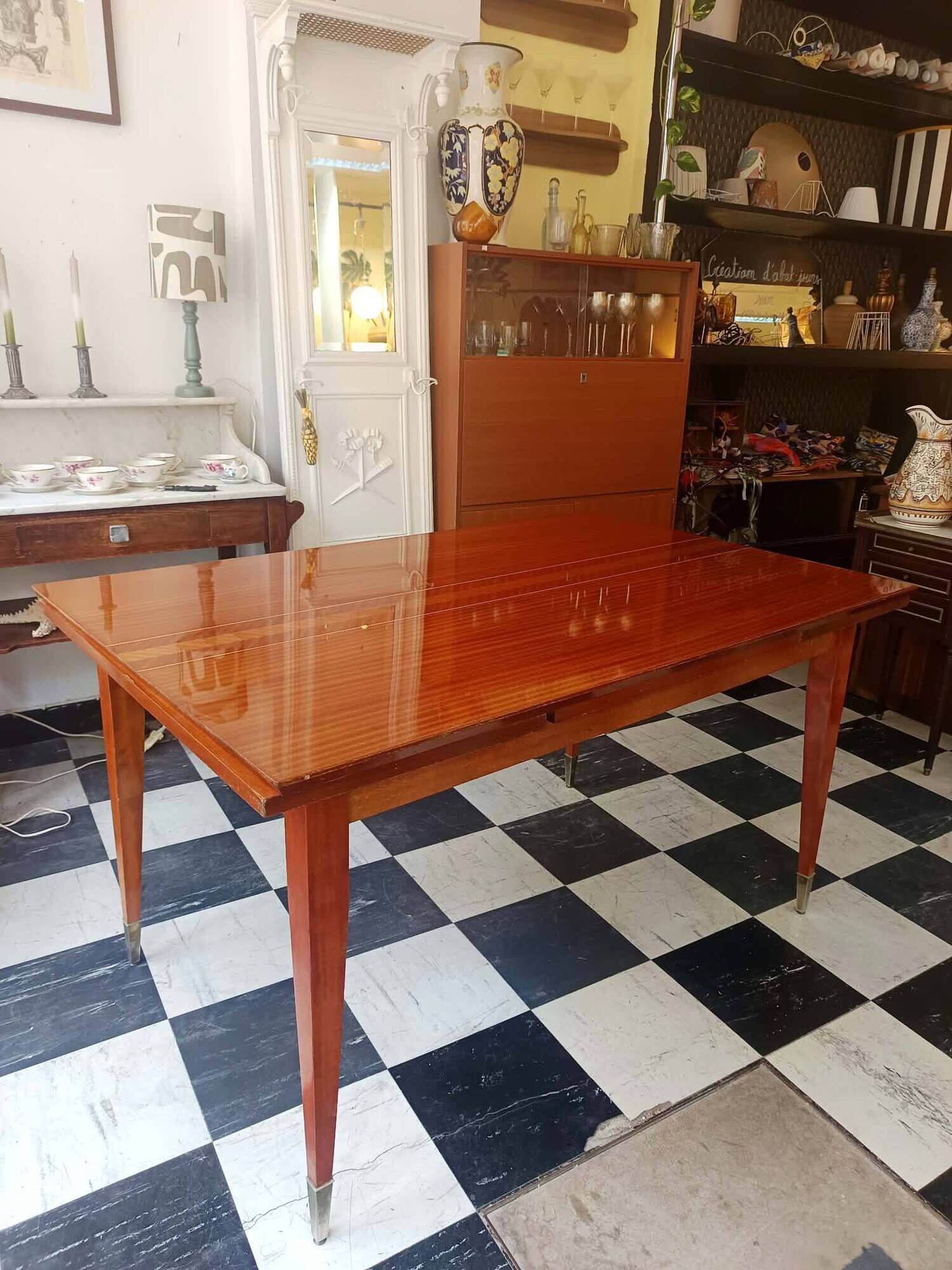 Mid-century vintage coffee table with tapered legs.