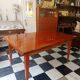 Mid-century vintage coffee table with tapered legs.