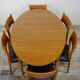 Wooden oval table and 6 matching chairs 60