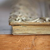 Gilded wooden and stucco frame