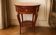 Vintage side table inlaid with Asian motifs and gilded bronze.
