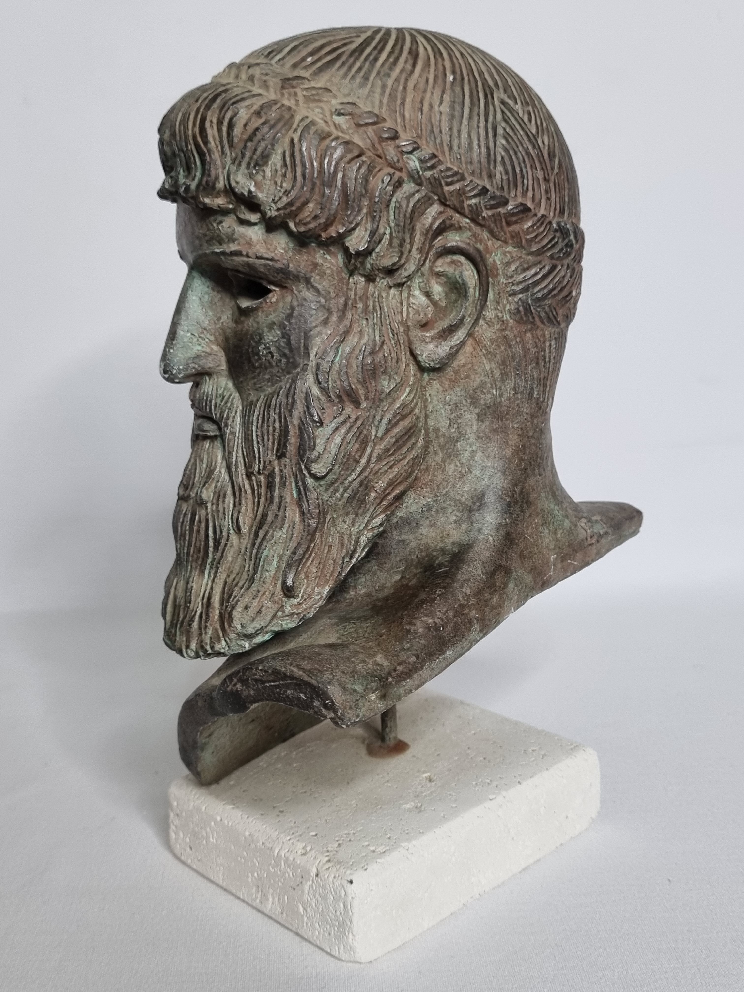 Bust of Poseidon in patinated plaster on plaster base,