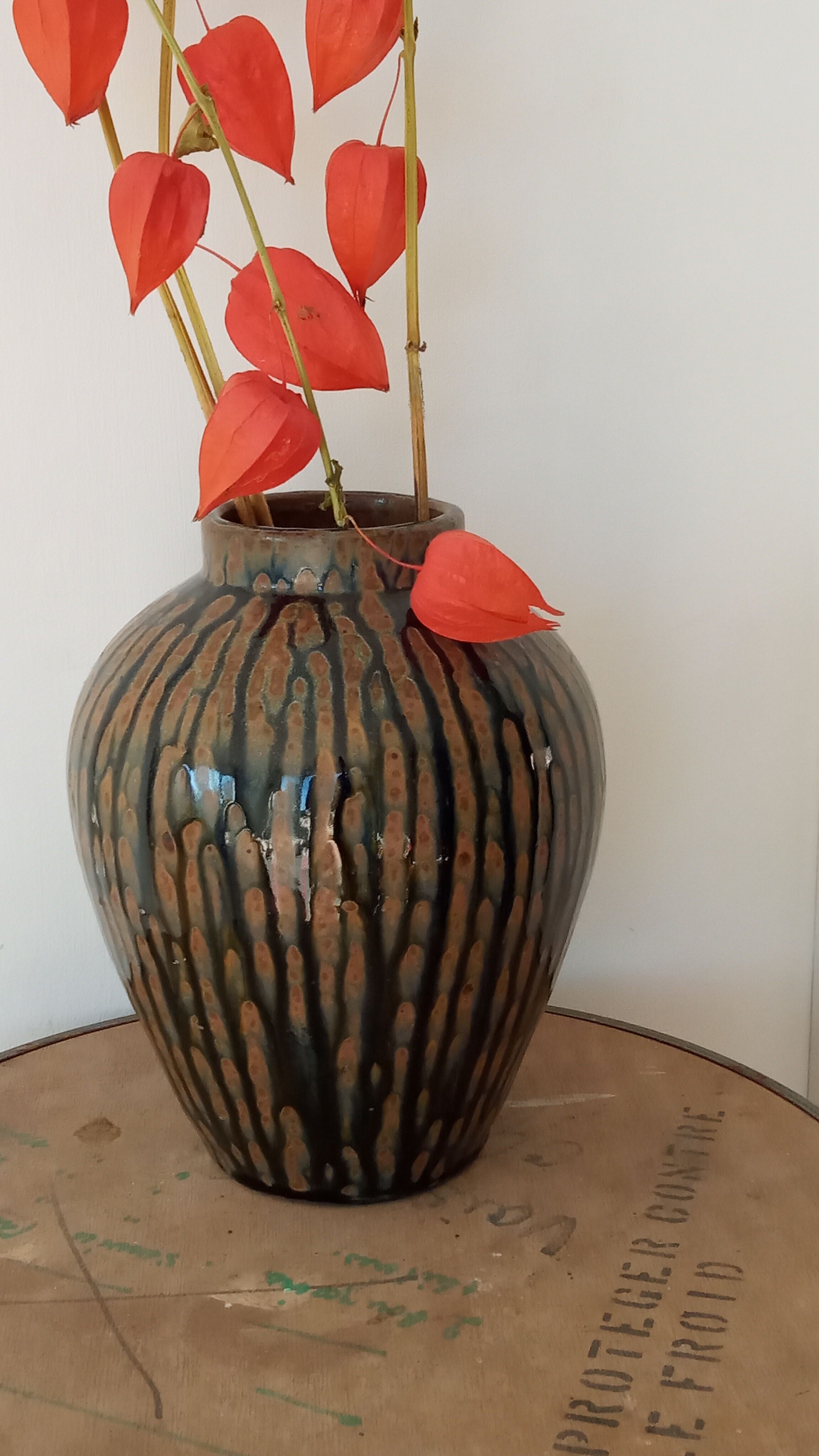 Enamelled sandstone vase