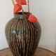 Enamelled sandstone vase