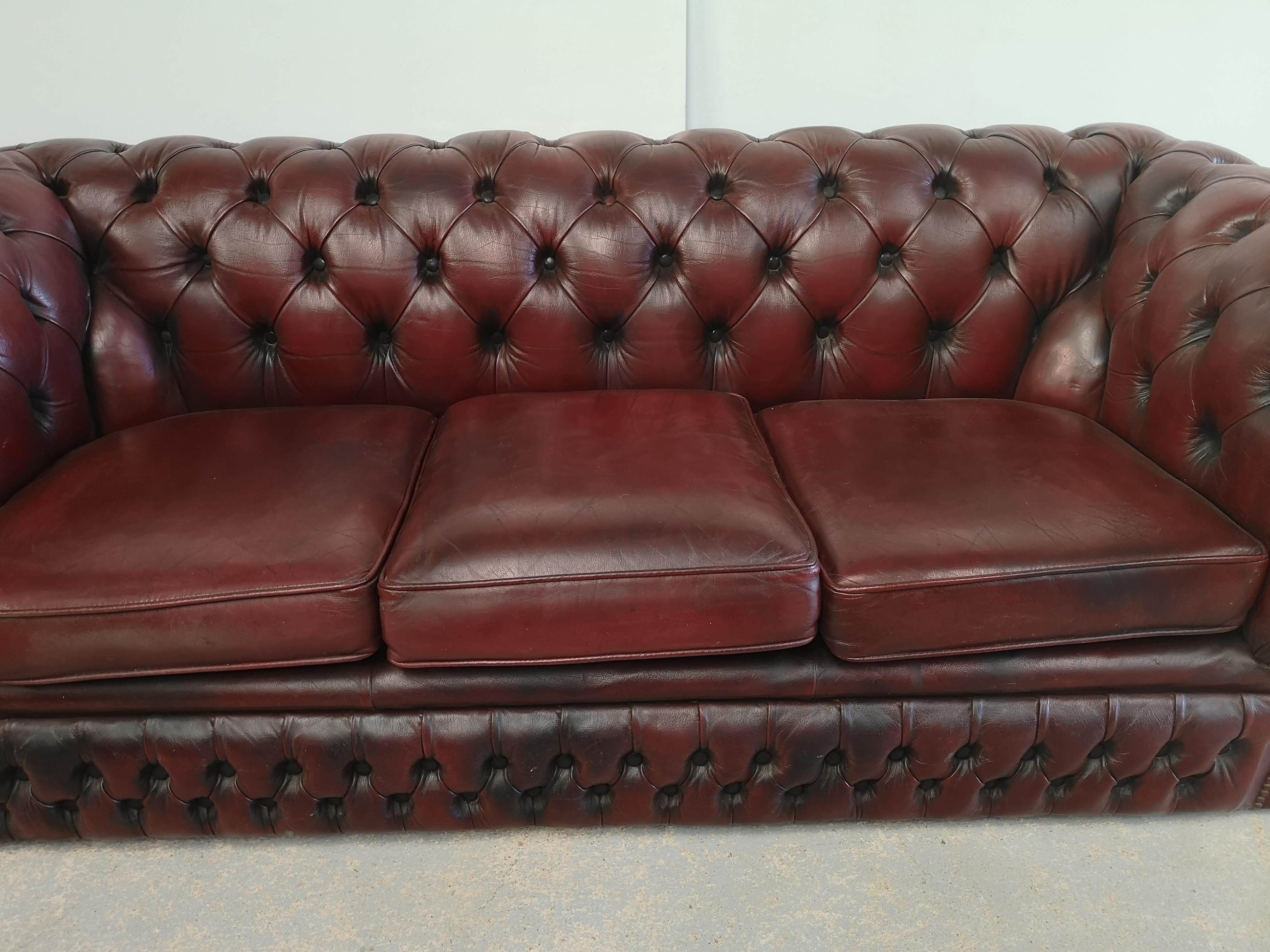 Burgundy leather chesterfield sofa
