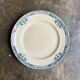 Longchamp flat plate in iron earth, “Lily” service