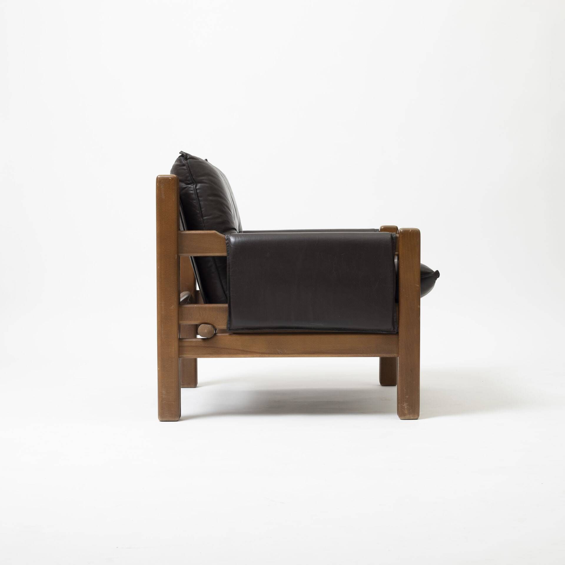 Pair of lounge chairs produced by TON in wood and brown leather, Czechoslovakia, 1990s
