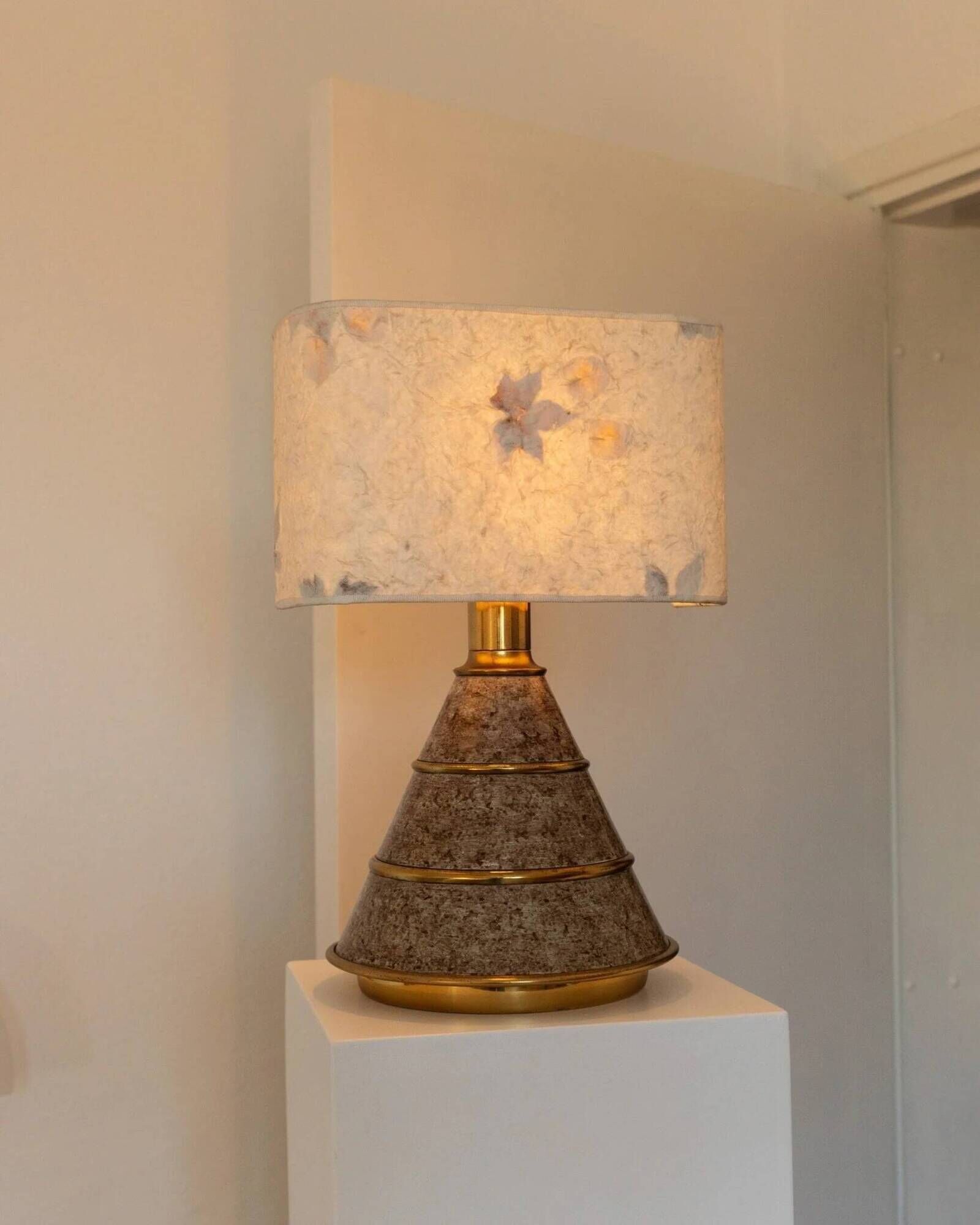 Brown ceramic mid-century table lamp with cream handmade paper floral shade and brass accents