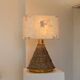 Brown ceramic mid-century table lamp with cream handmade paper floral shade and brass accents
