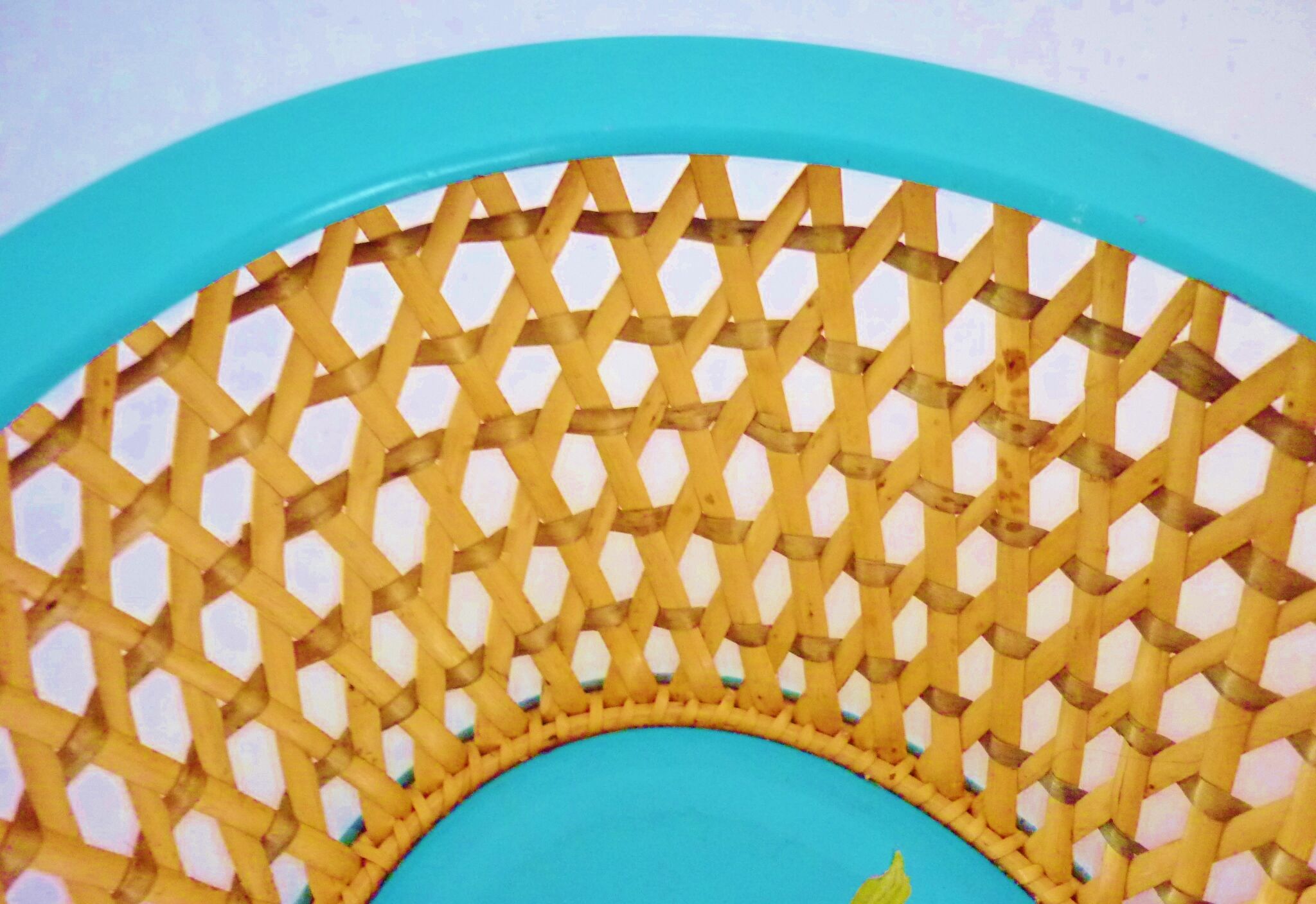 Antique basket in painted sheet metal and woven wicker, decorated with roses