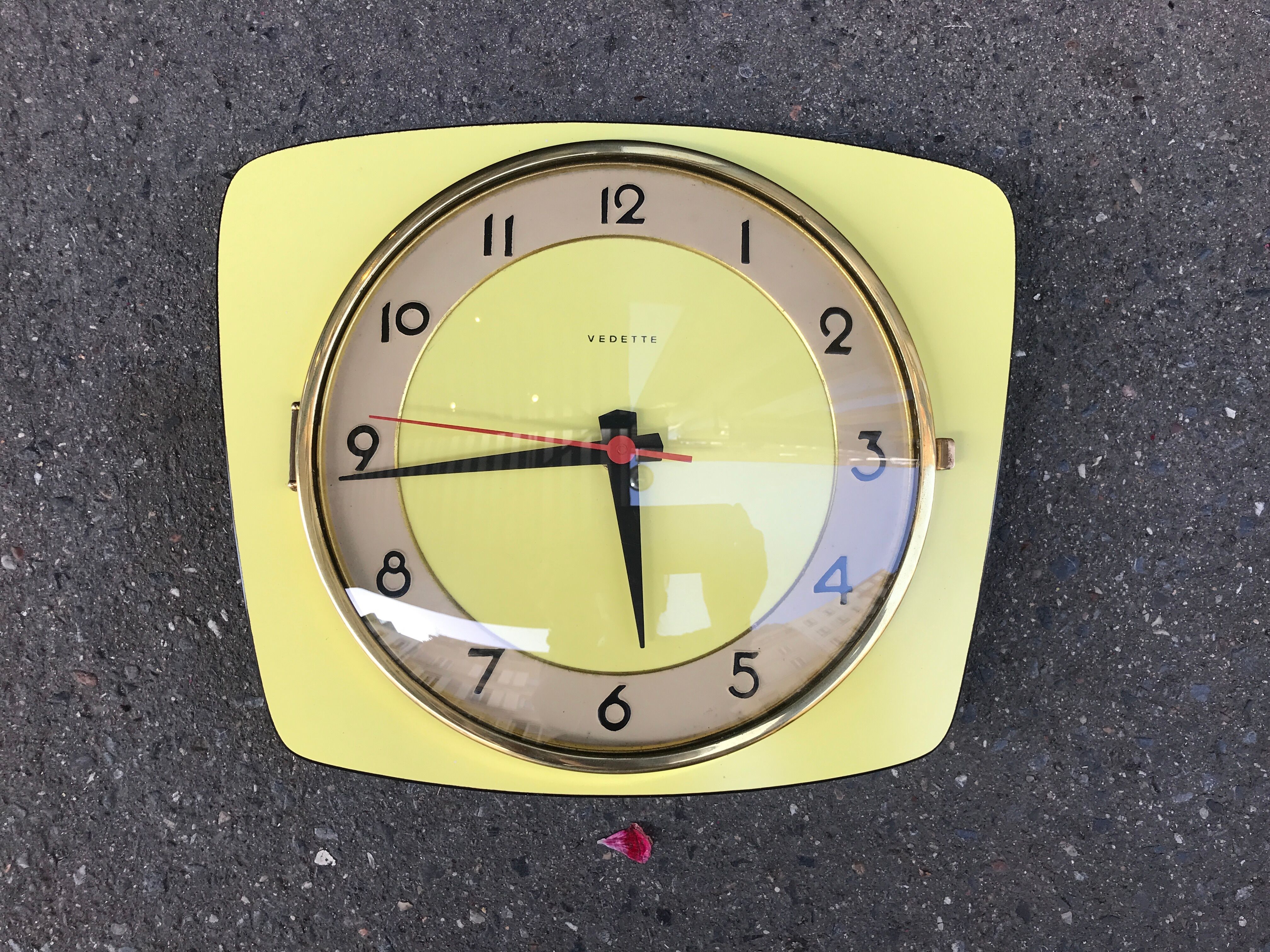 Vintage clock star Formica yellow wall pendulum
