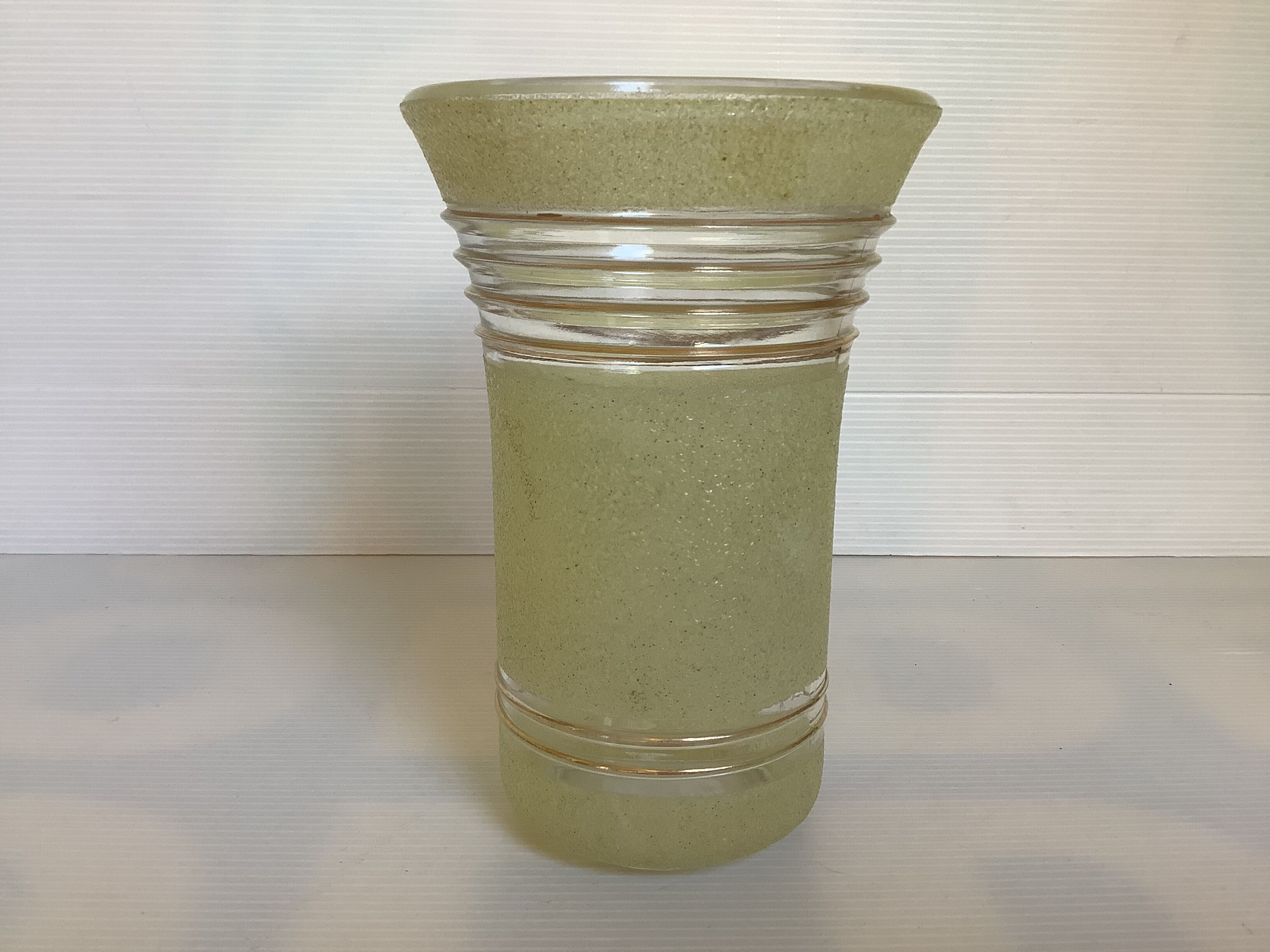 Old yellow frosted glass vase