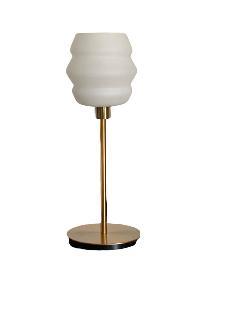 Table lamp with a vintage white glass globe and a golden base