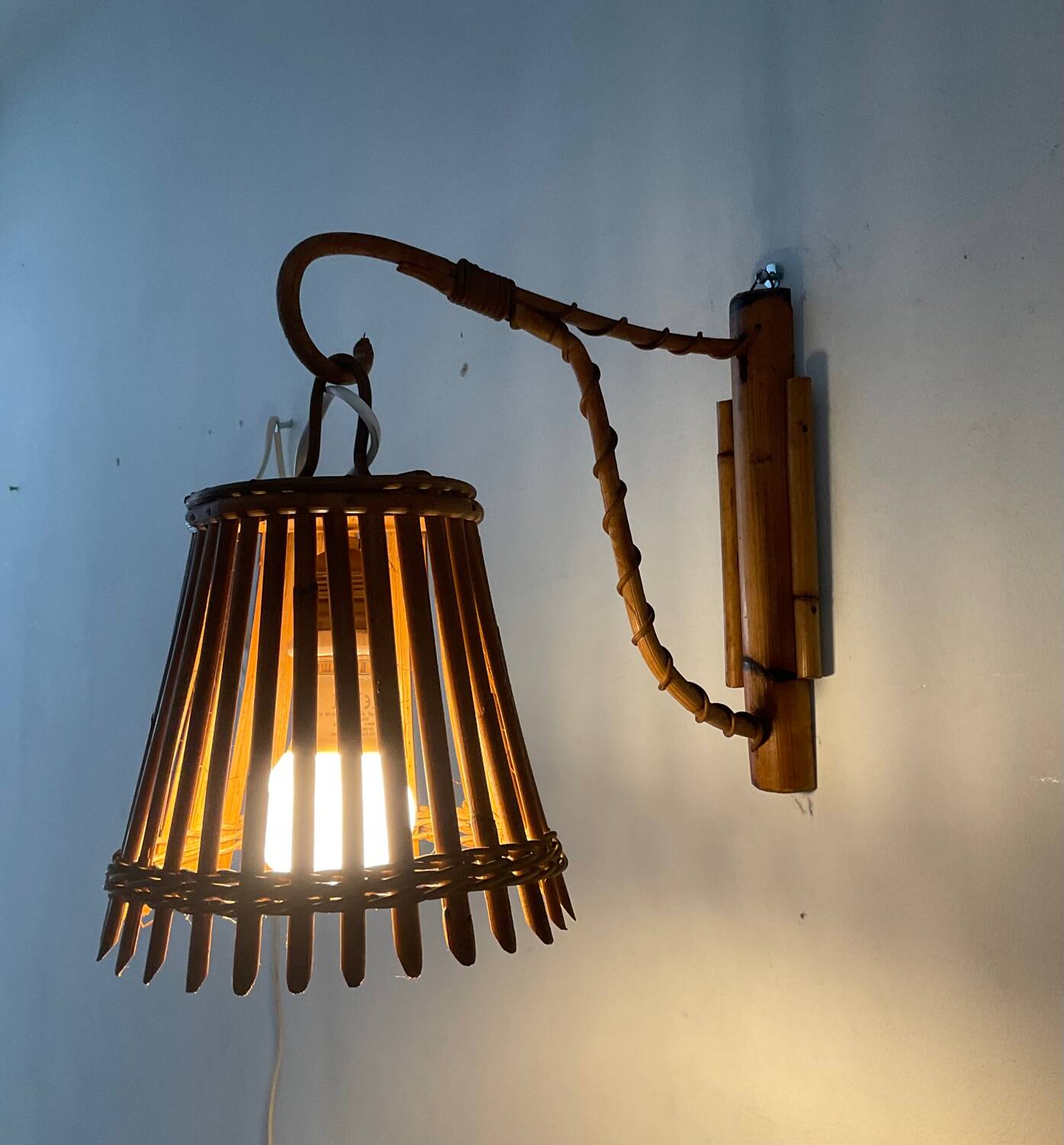Louis Sognot rattan wall lamp from the 50s and 60s
