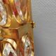Swedish wall lamp in gold-colored metal with glass prisms. Estimated 1970-80s.