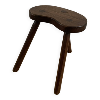 Old wooden tripod stool