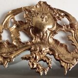 Antique mirror in gilded metal