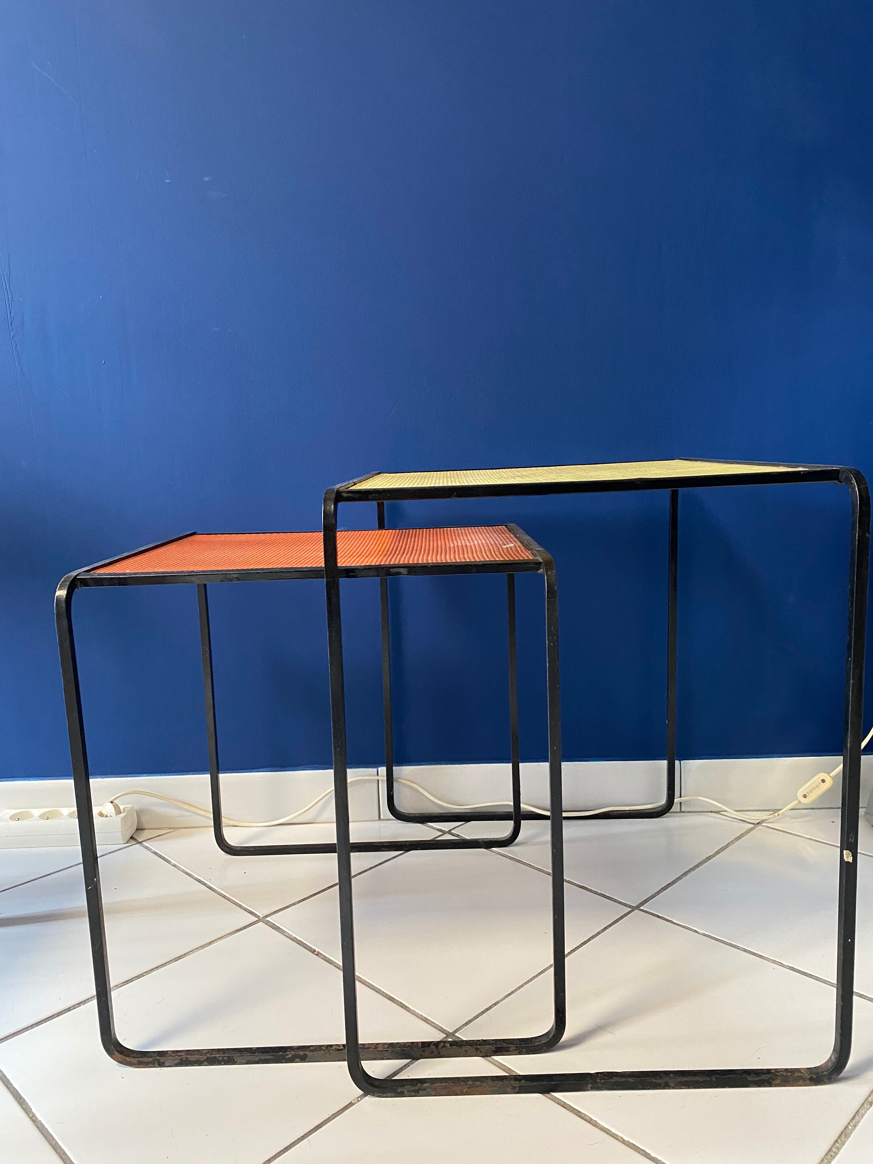Set of Mathieu Matégot metal pull-out tables