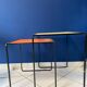 Set of Mathieu Matégot metal pull-out tables