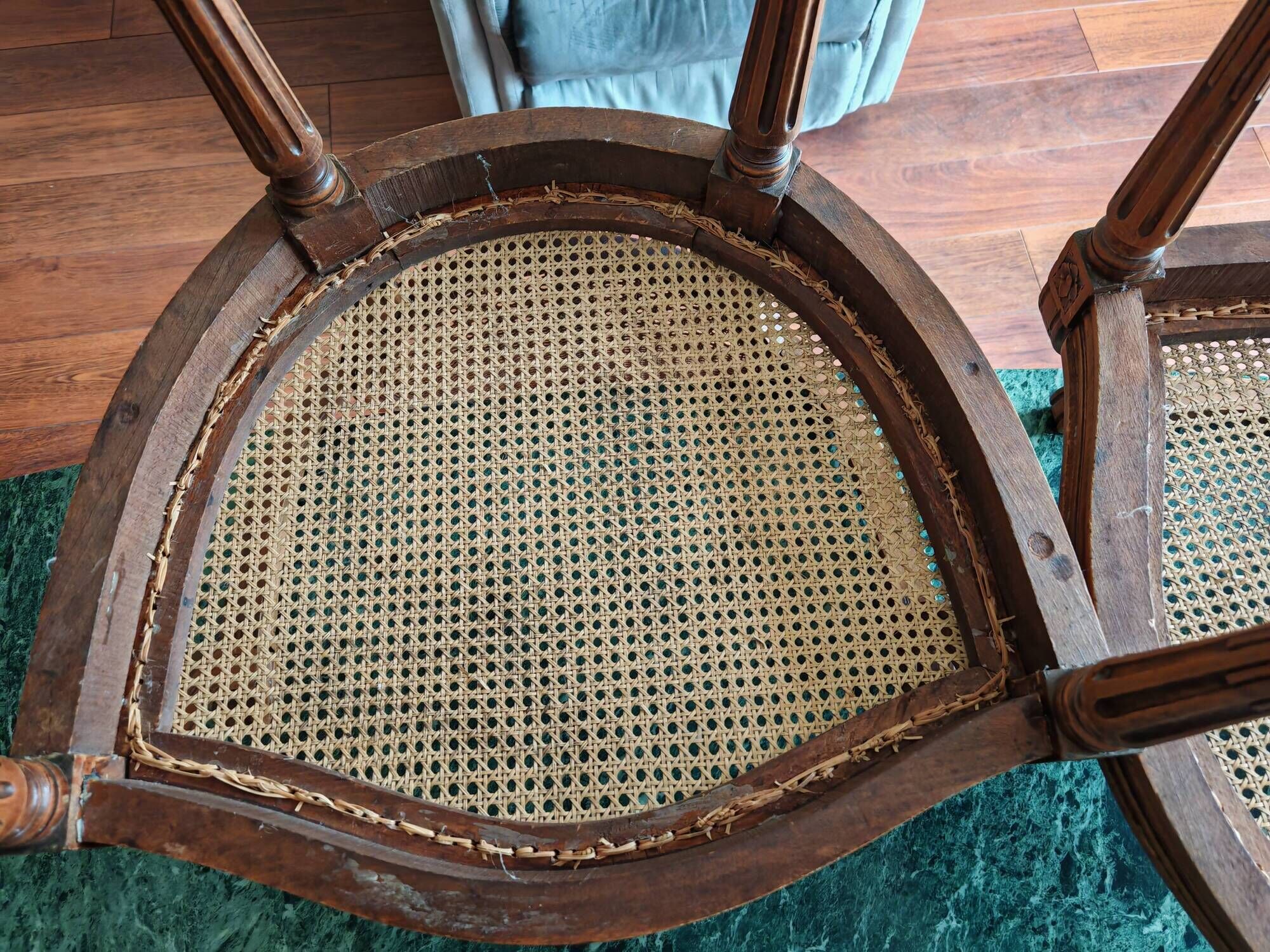 Caned armchairs