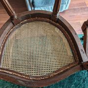 Caned armchairs