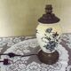 Lampe de table en porcelaine et laiton