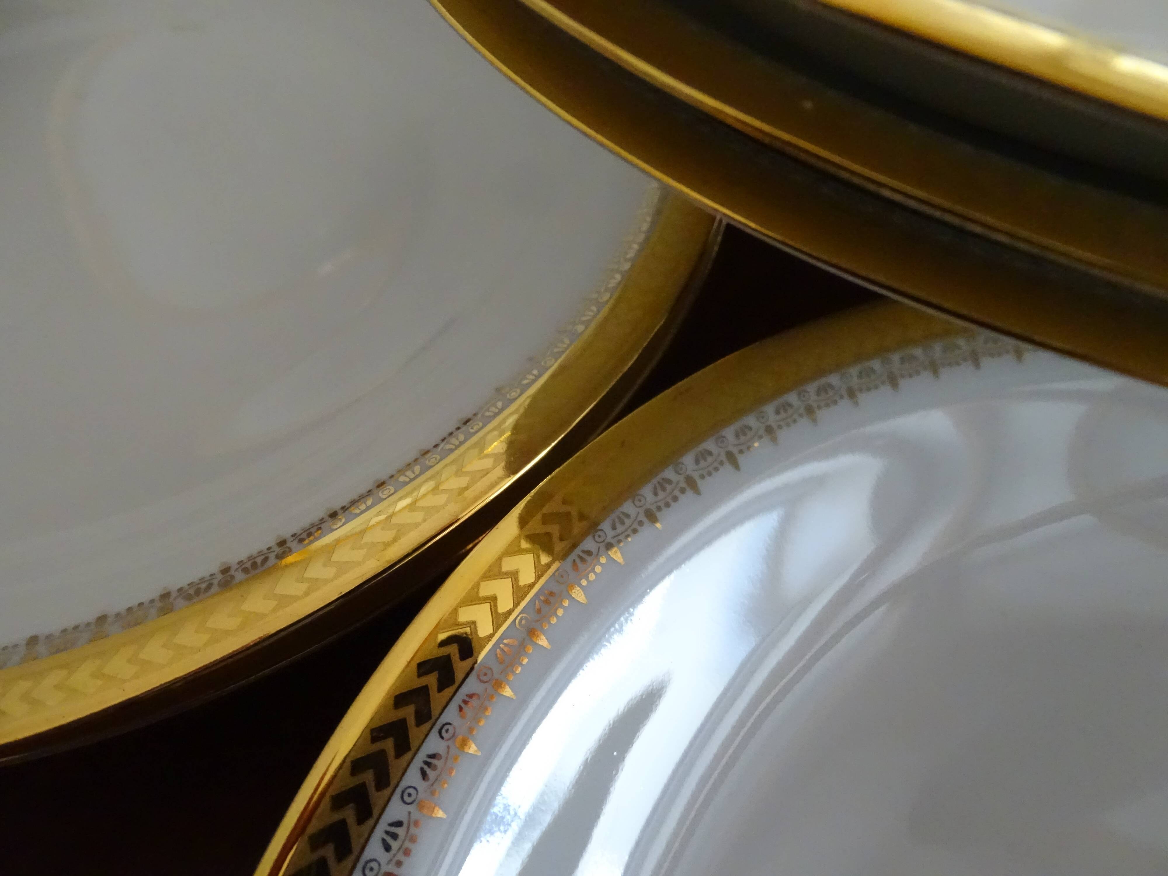 12 hollow plates porcelain of Sologne Larchevèque white and golden signed