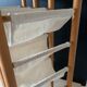 Range bouteilles bois et tissu