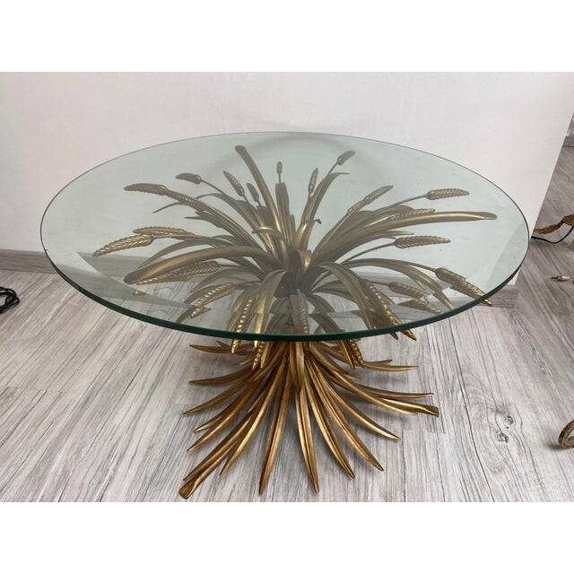 Old gold florentine wrought iron ears cofee table