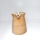 Vintage creamer in marsh sandstone