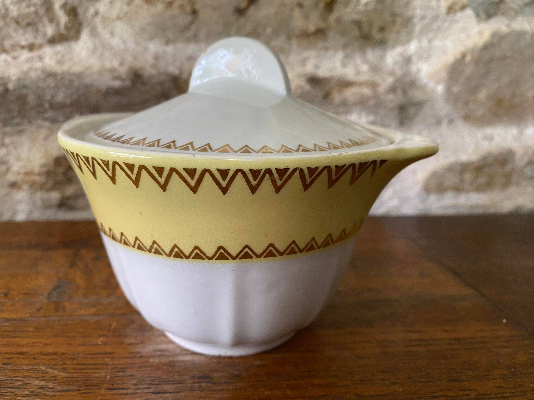 Sugar bowl or candy dish in white earthenware with yellow and gold frieze decoration