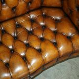 Vintage Chesterfield serpentine luxury sofa in restored leather