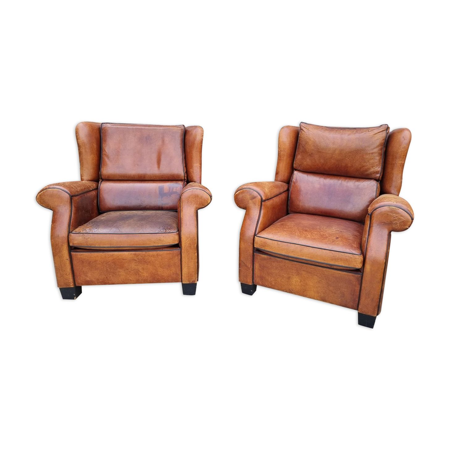 Paire de fauteuils club en cuir des années 1980