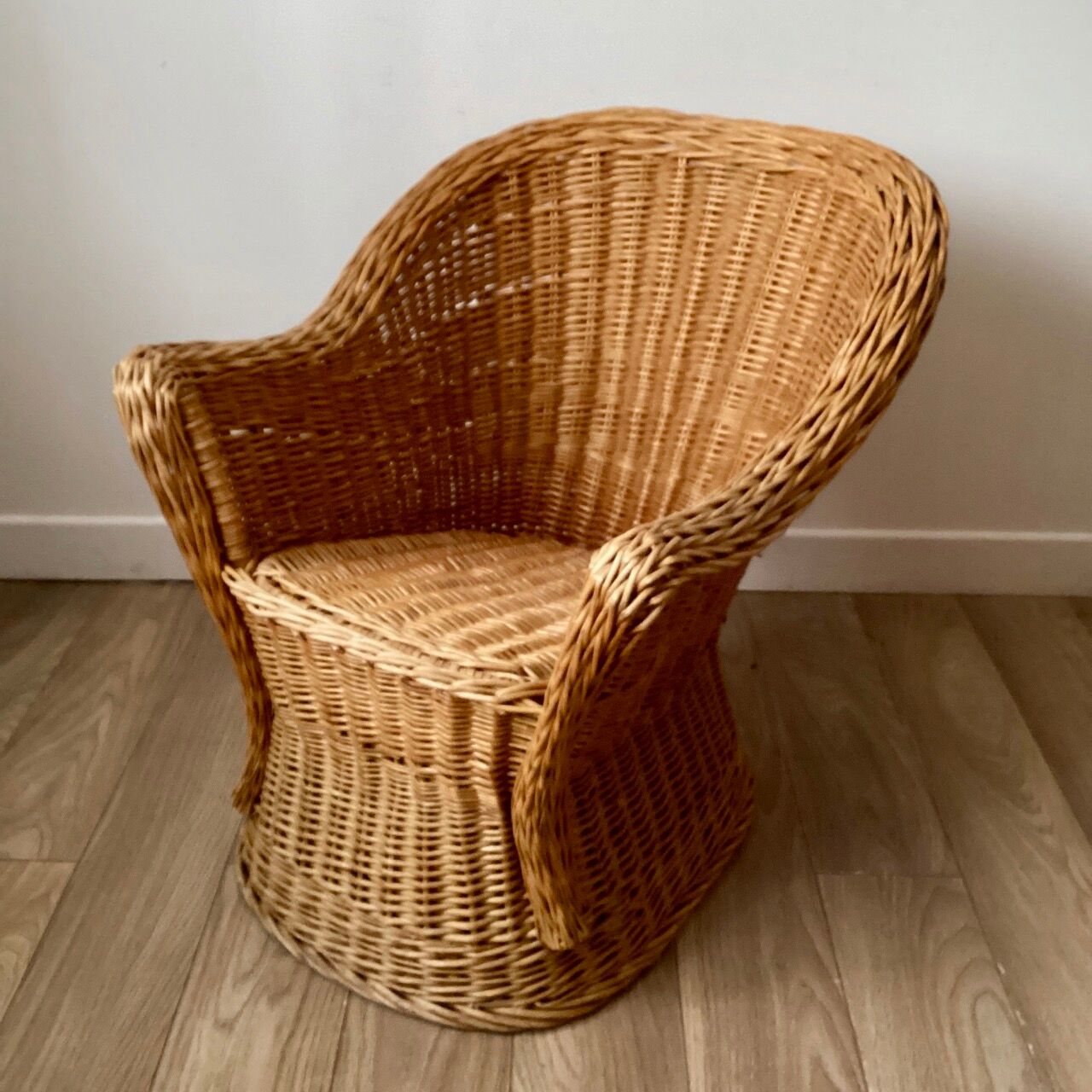 Braided wicker armchair