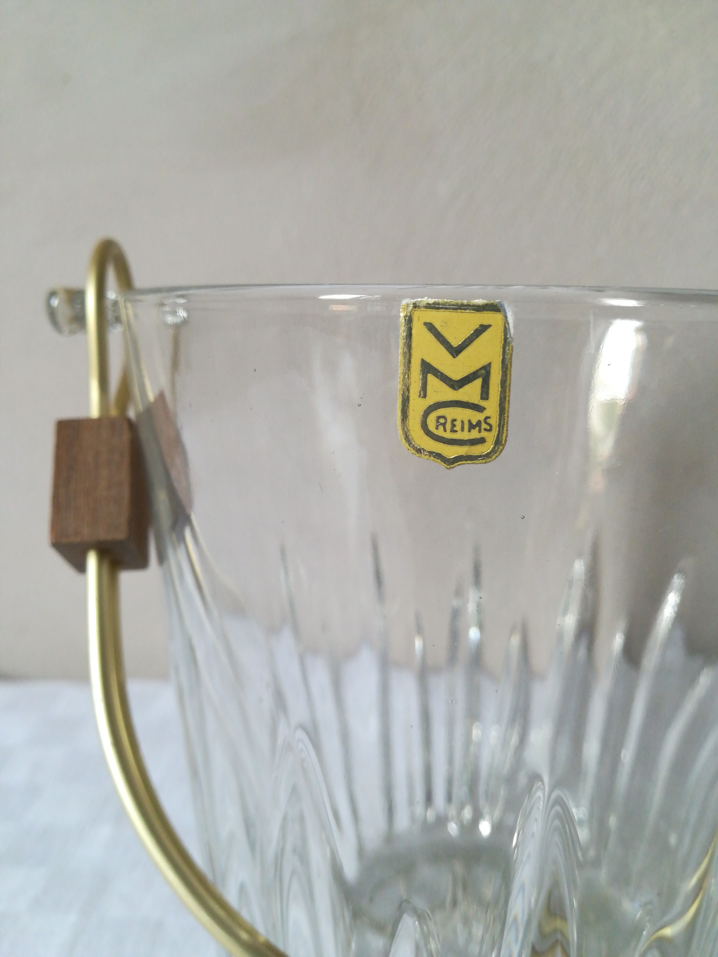 Ice bucket with gold and teak handle