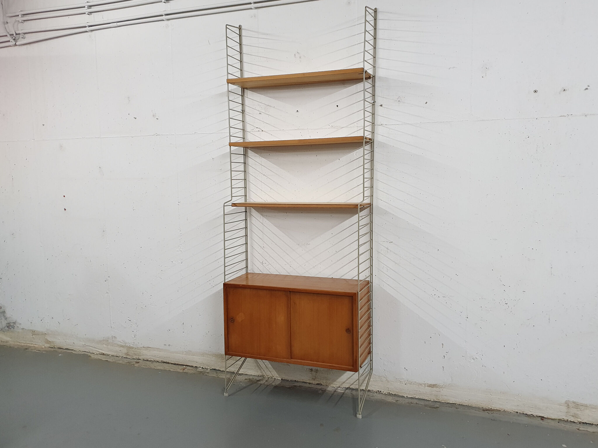 Pinewood wall unit by Nils “Nisse” Strinning for String, Sweden 1950's