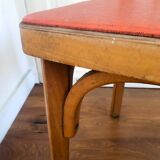 Baumann chair stamped in red skai