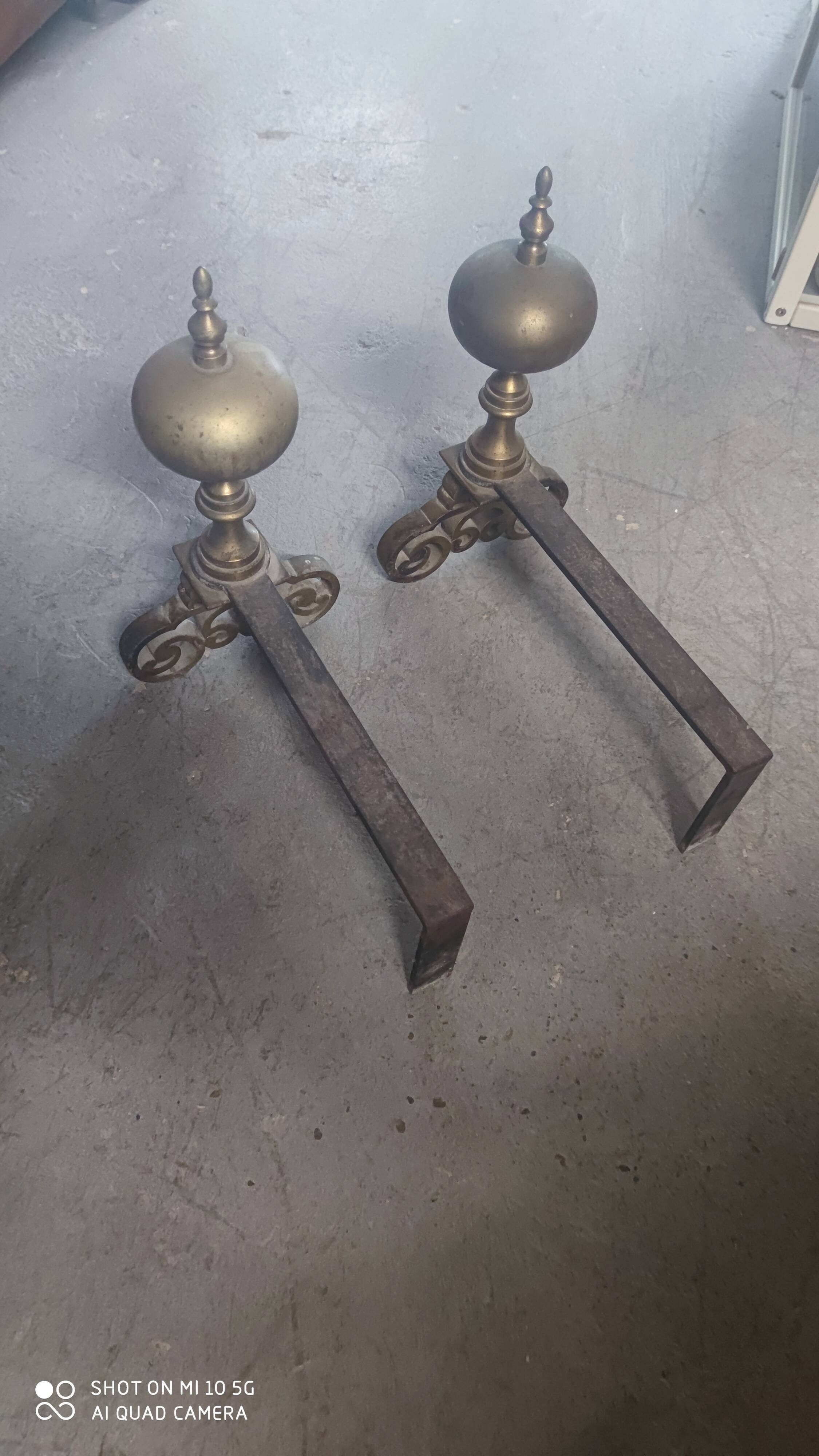 Pair of bronze and steel andirons, 19th century, Holland