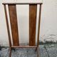 Old wooden shop rack valet casters
